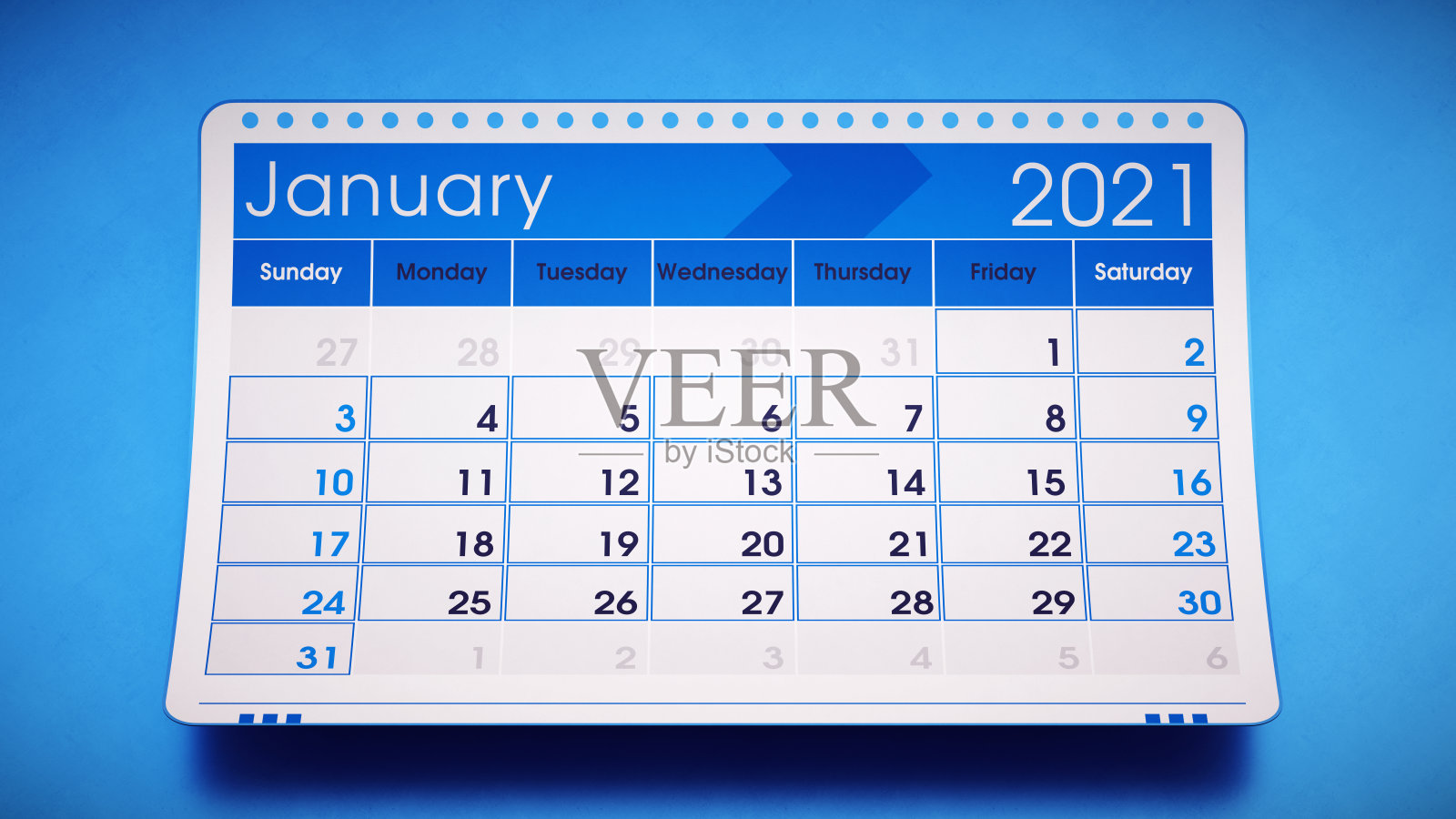2021年1月日历页面设计为蓝色，悬挂在有纹理的蓝色背景上照片摄影图片