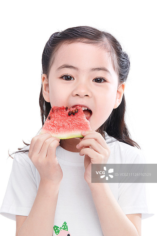 可爱的小女孩吃西瓜图片素材