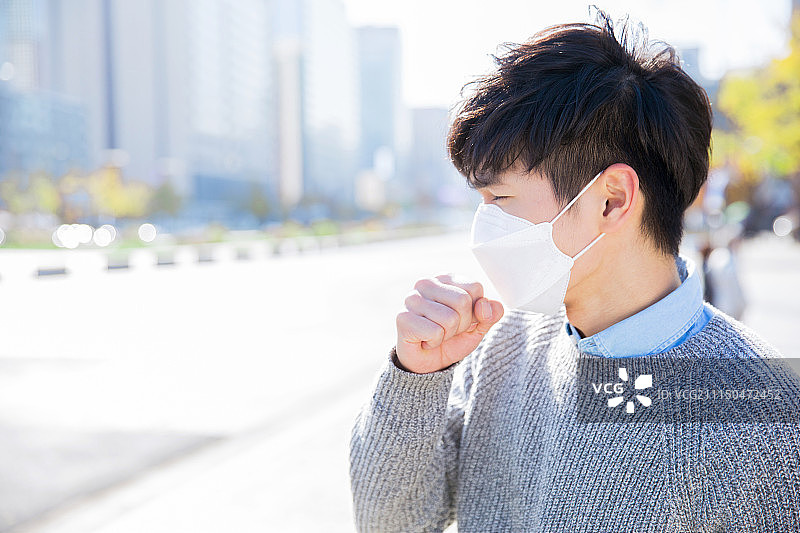 韩国，男性，烟雾(空气污染)，灰尘，寒冷，空气污染，污染(环境污染)，口罩图片素材