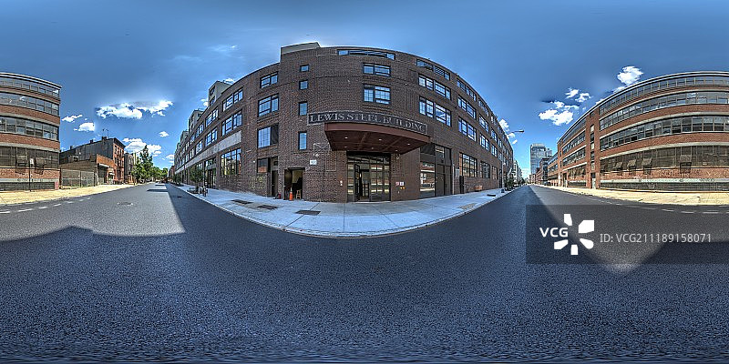 360掳 HDRI showing an asphalt road with brick factory buildings in United States图片素材