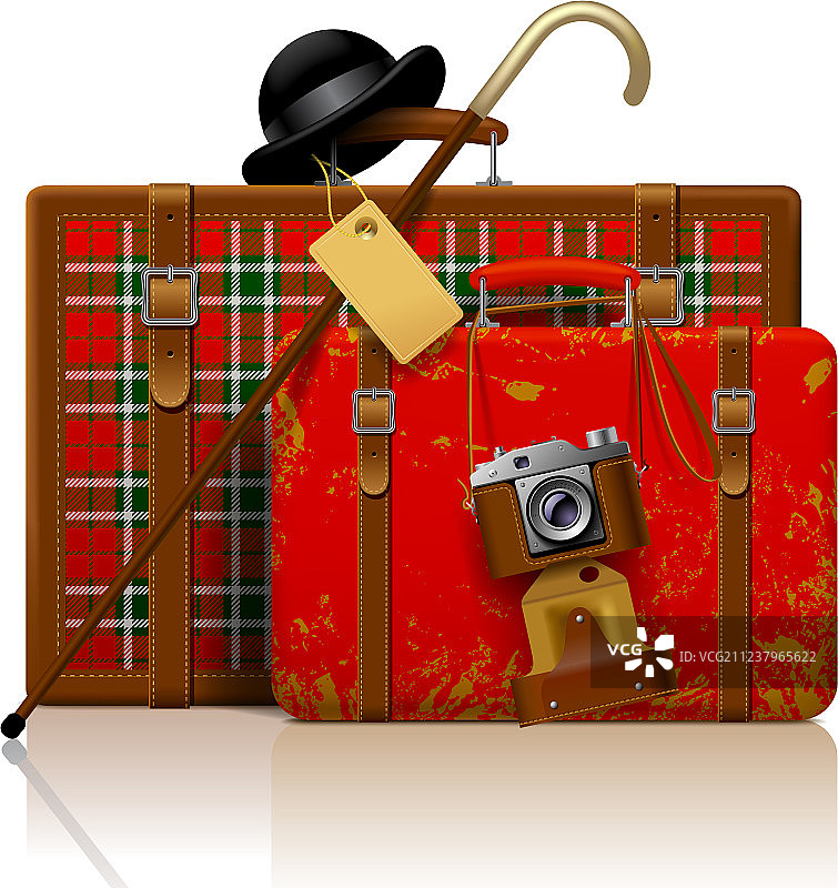 红色的旧手提箱和手杖圆顶硬礼帽图片素材