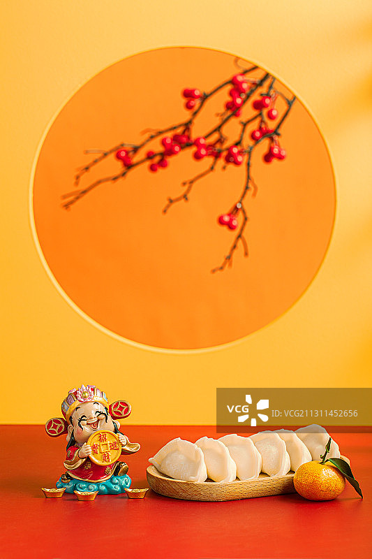 新年财神爷摆件和冬至饺子,金元宝图片素材