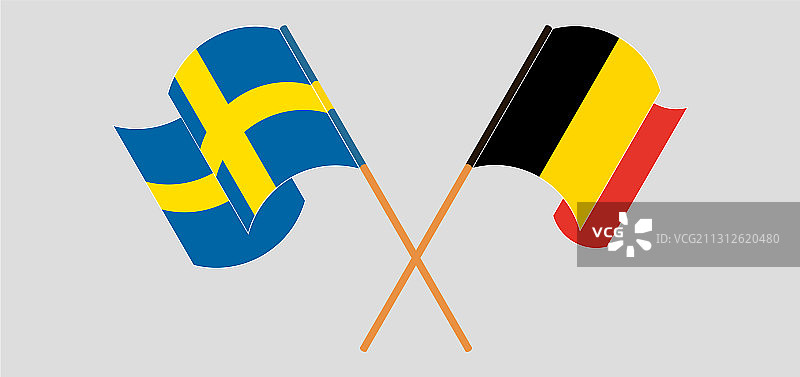 交叉和挥舞比利时和瑞典的旗帜图片素材