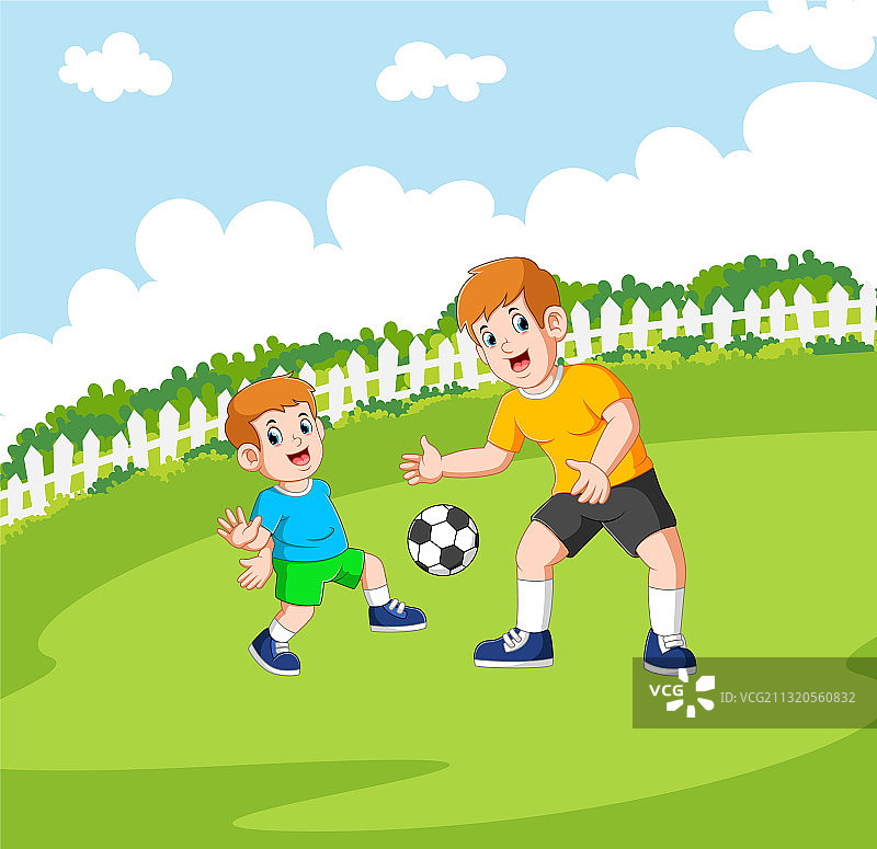 两个男孩在踢足球图片素材