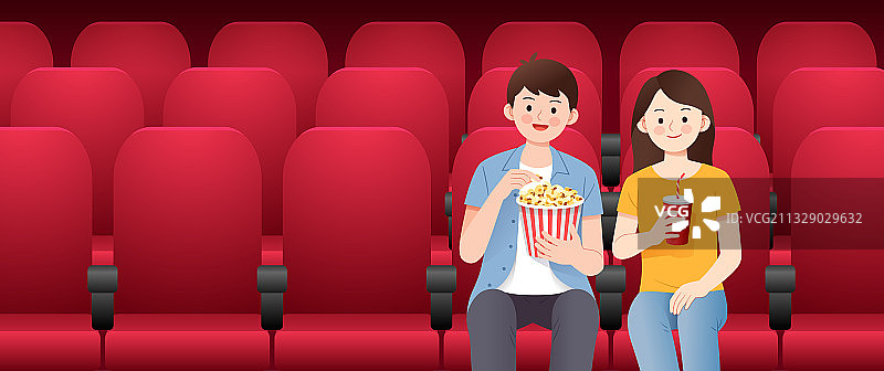 一对情侣坐在电影院看电影图片素材