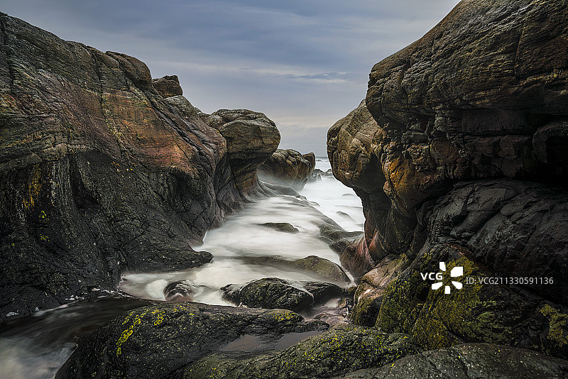 挪威阿尔内斯，海天相映的岩石风景图片素材