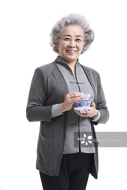 老年女子喝茶图片素材