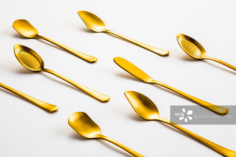 金色不锈钢甜品勺黄油刀图片素材