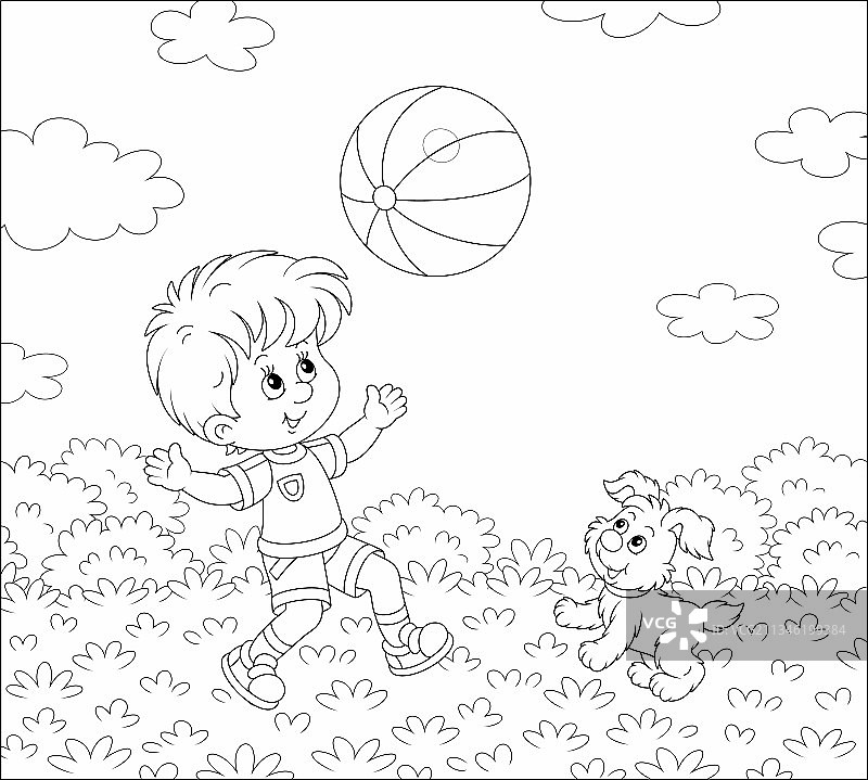 一个小男孩在和一只快乐的小狗玩球图片素材