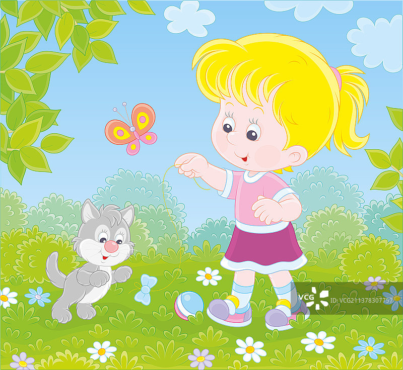 小女孩和一只灰猫在草坪上图片素材
