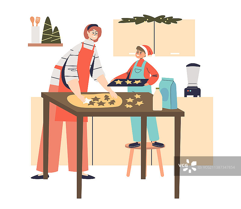 母亲和孩子烹饪传统的圣诞节图片素材