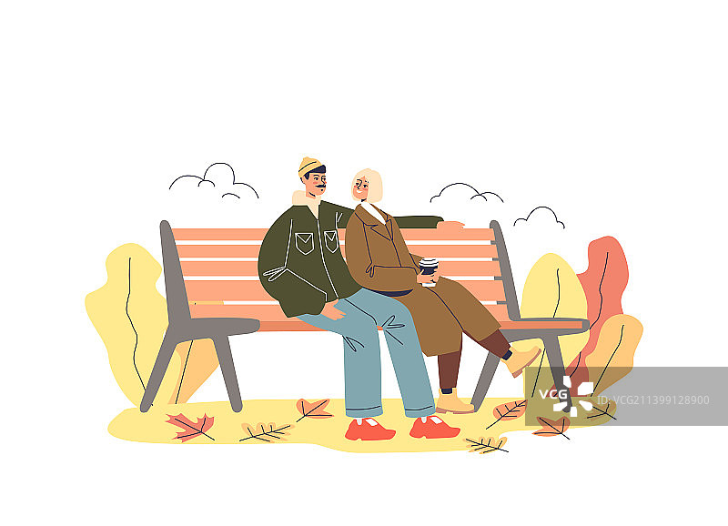 浪漫的情侣在秋天坐在长椅上约会图片素材
