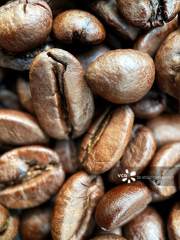 新鲜咖啡豆的宏观背景或墙纸图片素材