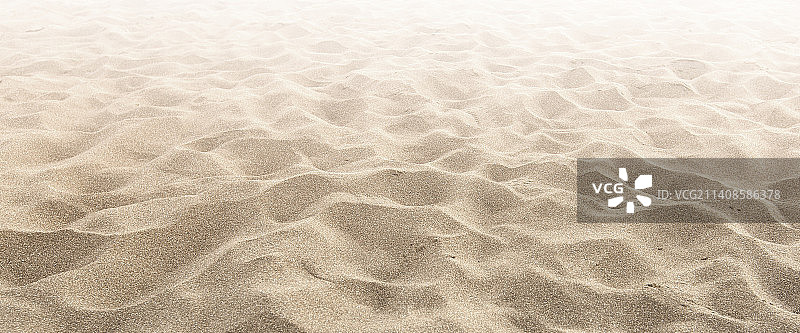 沙滩上的沙子作为背景选择性聚焦图片素材