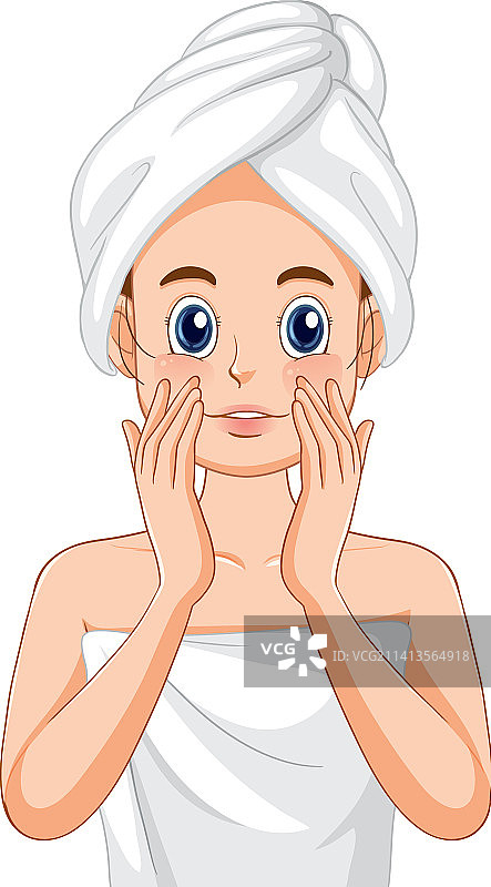 一个裹着毛巾的女人在做面部按摩图片素材