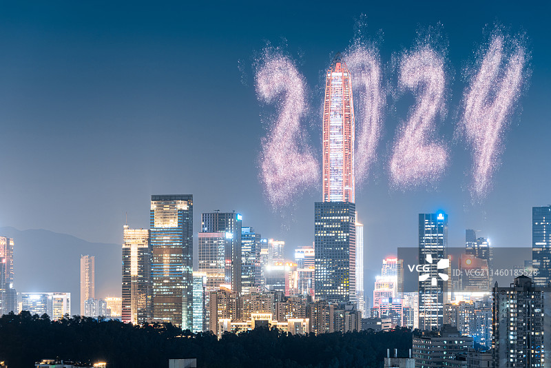 2024年新年焰火概念和深圳福田CBD城市地标建筑群夜晚风光图片素材