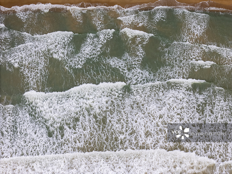 鸟瞰绿松石般的海水沙滩图片素材