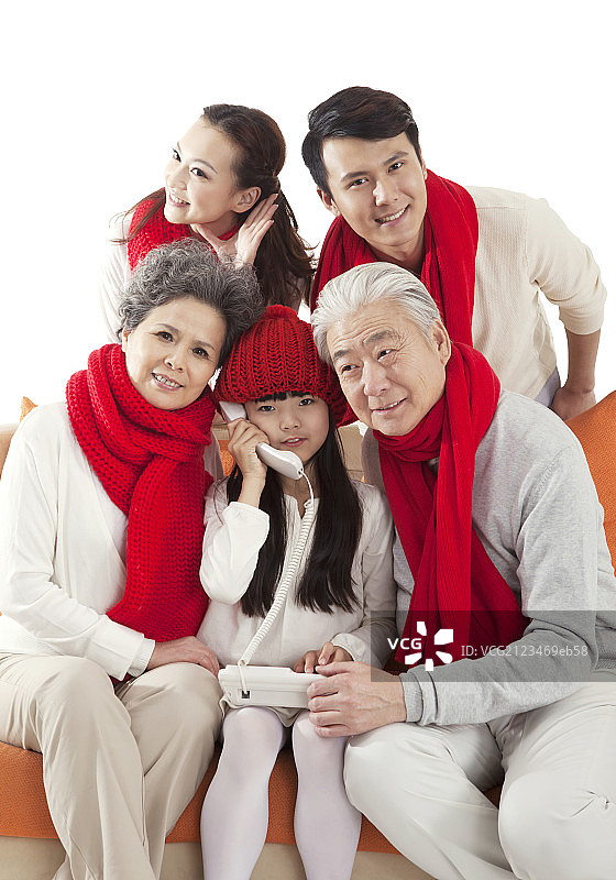 东方家庭打电话祝贺春节图片素材