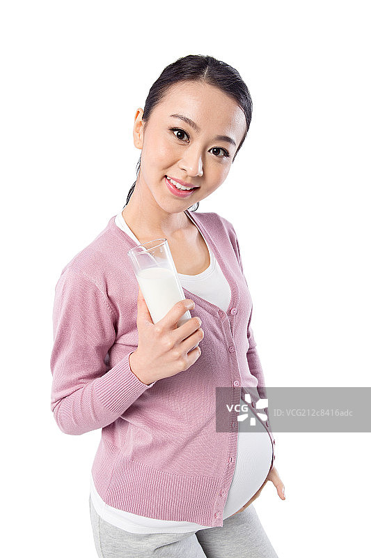 手拿牛奶的孕妇图片素材