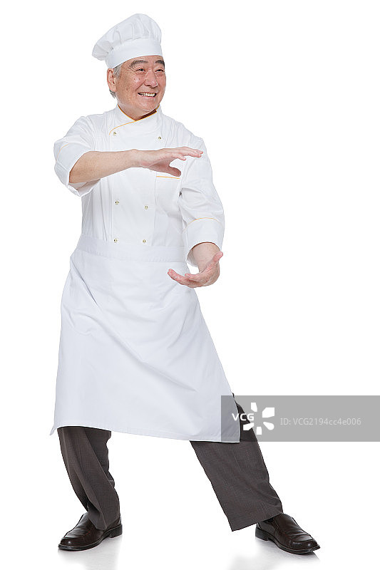 兴奋的老年男人穿着厨师服图片素材