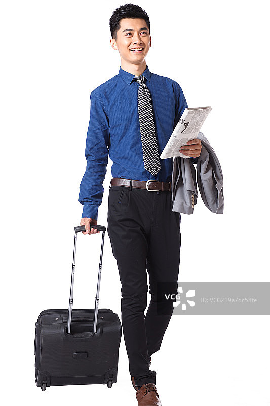 商务男士拉着行李箱图片素材