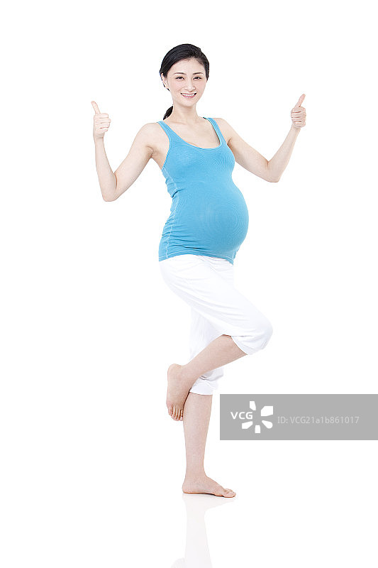 孕妇竖起大拇指图片素材