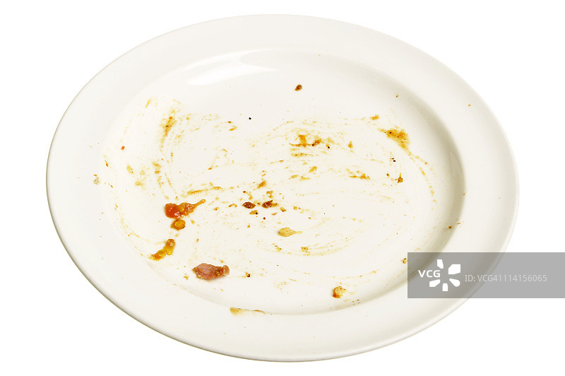 清空白色盘子上的食物残渣图片素材