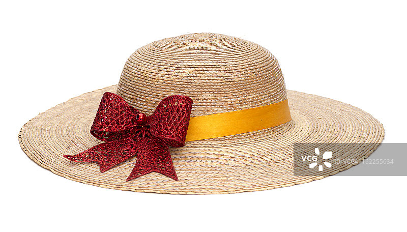 带黄色丝带和红色蝴蝶结的帽子图片素材