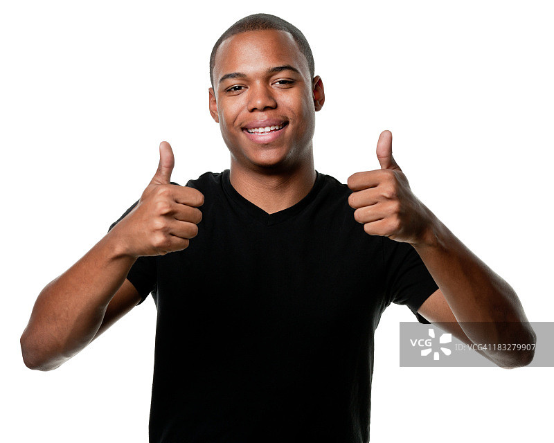 快乐的年轻人竖起大拇指图片素材