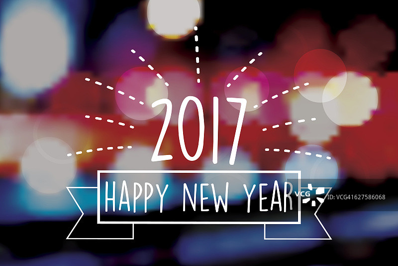 2017年新年的文字符号在模糊的烟花背景上图片素材