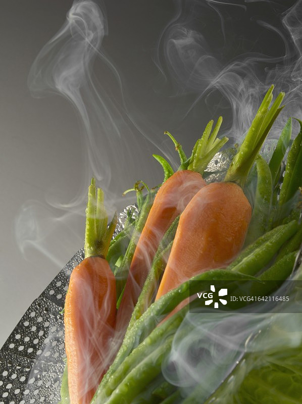 蒸汽烹饪蔬菜图片素材