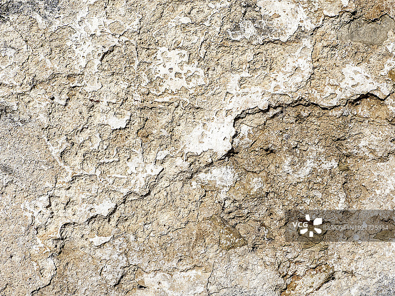 完整的水泥墙立面设置，古老且有裂缝。图片素材