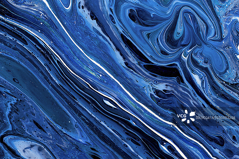 抽象色彩的背景纹理流体艺术丙烯酸颜料。深蓝色的颜色图片素材