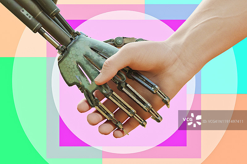 机器人和人类握手图片素材