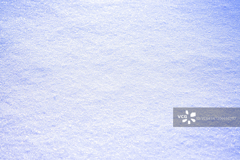 雪面背景接近在阳光明媚的冬日图片素材