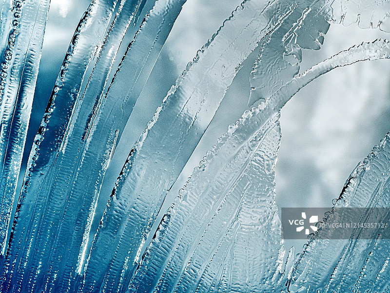 整个框架的纹理形成了一块裂冰在蓝色的背景。图片素材