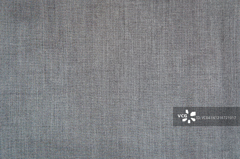 褐色和灰色织物布纹理背景。图片素材
