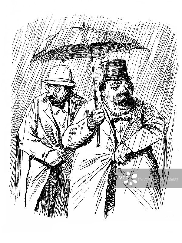 两个人在雨中打伞的肖像图片素材