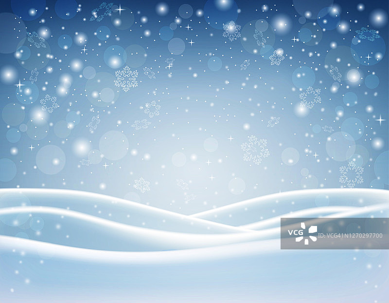 摘要圣诞节淡蓝色背景。冬天的季节。背景与降雪。蓝色的天空上飘着洁白的雪花。图片素材