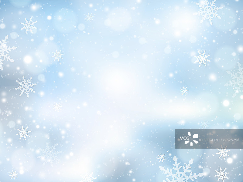 冬天蓝色的天空和飘落的雪花。圣诞快乐，新年快乐，背景是雪花。图片素材