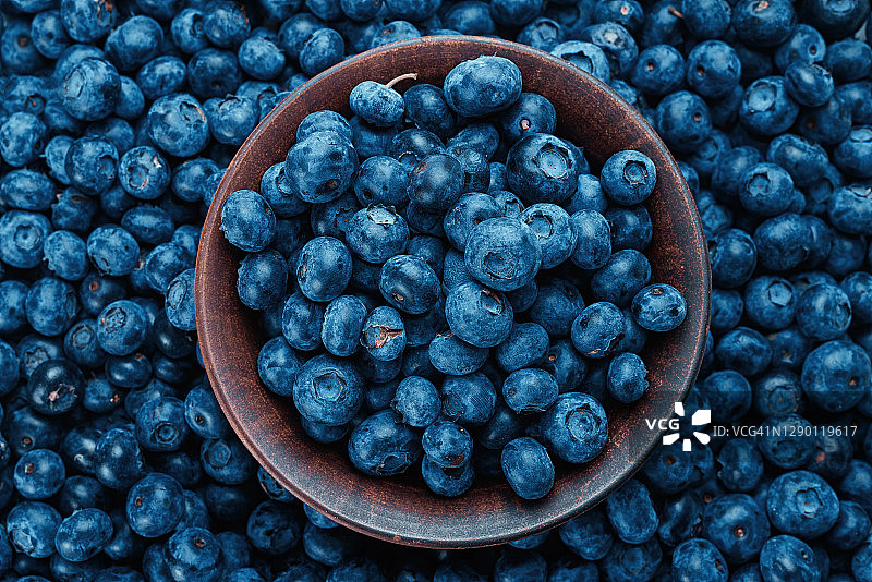 新鲜蓝莓背景。图片素材