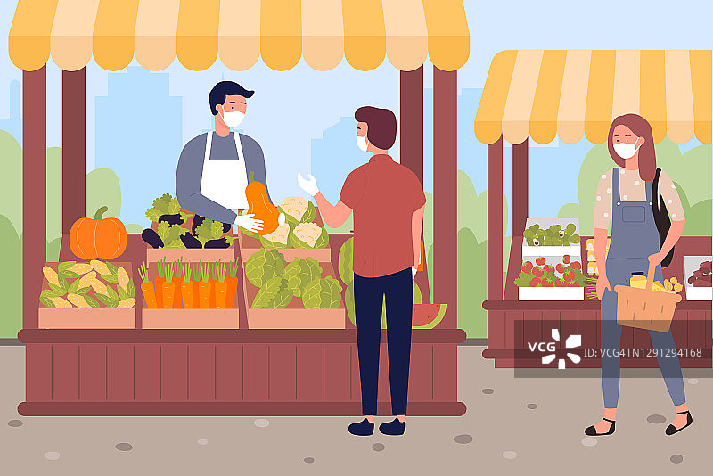 戴口罩的人在农贸市场买蔬菜和水果图片素材