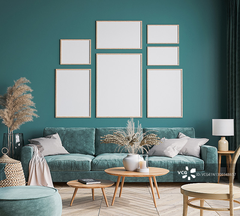 家居室内设计以绿色沙发、木桌和时尚装饰的绿色客厅、画廊墙、框架模型图片素材