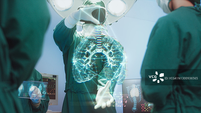 创新与医疗技术理念，外科医生团队采用高科技现代虚拟现实模拟器接口与全息图诊断手术室呼吸系统图片素材