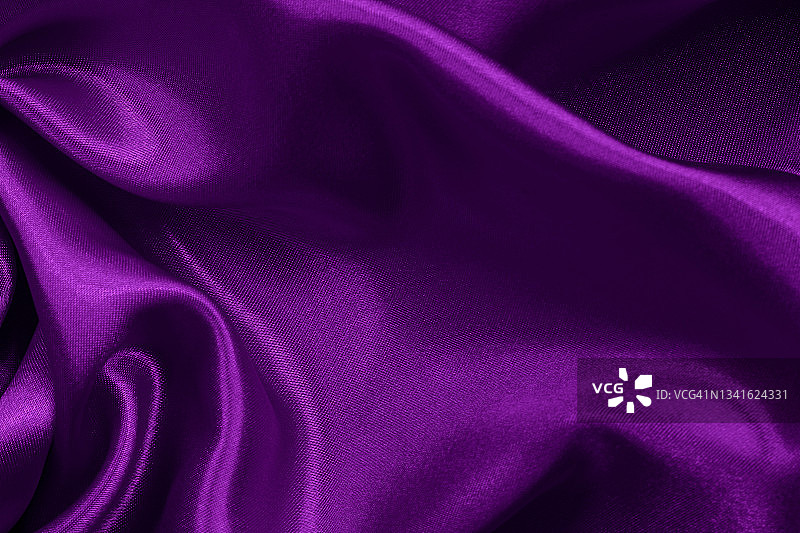 紫色面料质地背景，丝质或亚麻布图案细节。图片素材