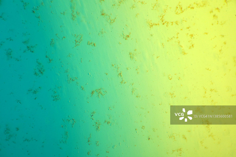 绿松石蓝黄色模糊梯度背景。明亮的无形的模式。图片素材
