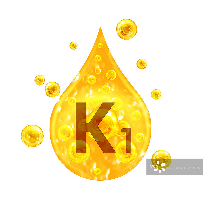 维生素K1。金色的水滴和带氧气泡泡的球。健康的概念。孤立在白色背景上图片素材