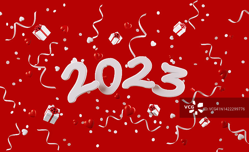 2023被红色背景下的礼盒五彩纸屑和派对旗包围图片素材