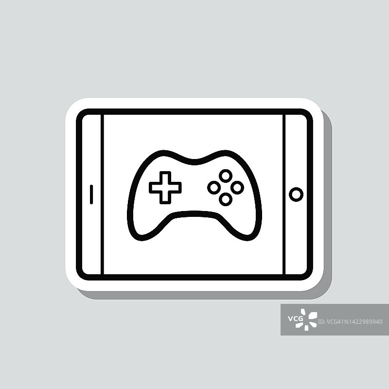 平板电脑视频游戏。图标贴纸在灰色背景图片素材