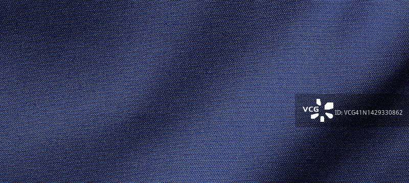 蓝色面料涤纶丝布料质地和纺织背景，宽横幅图片素材